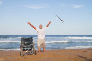 I'm free! senior man get up from wheelchair and throw away his walking cane